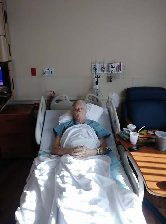 John Stromm In hosptal bed